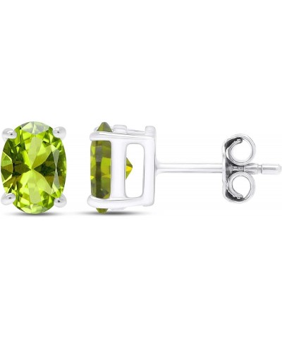 Oval Shape Stud Earrings In 14K White Gold Over Sterling Silver Simulated peridot $26.00 Earrings