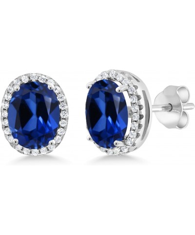 925 Sterling Silver Blue Created Sapphire Halo Earrings For Women (5.08 Cttw, Oval 9X7MM) $28.59 Earrings