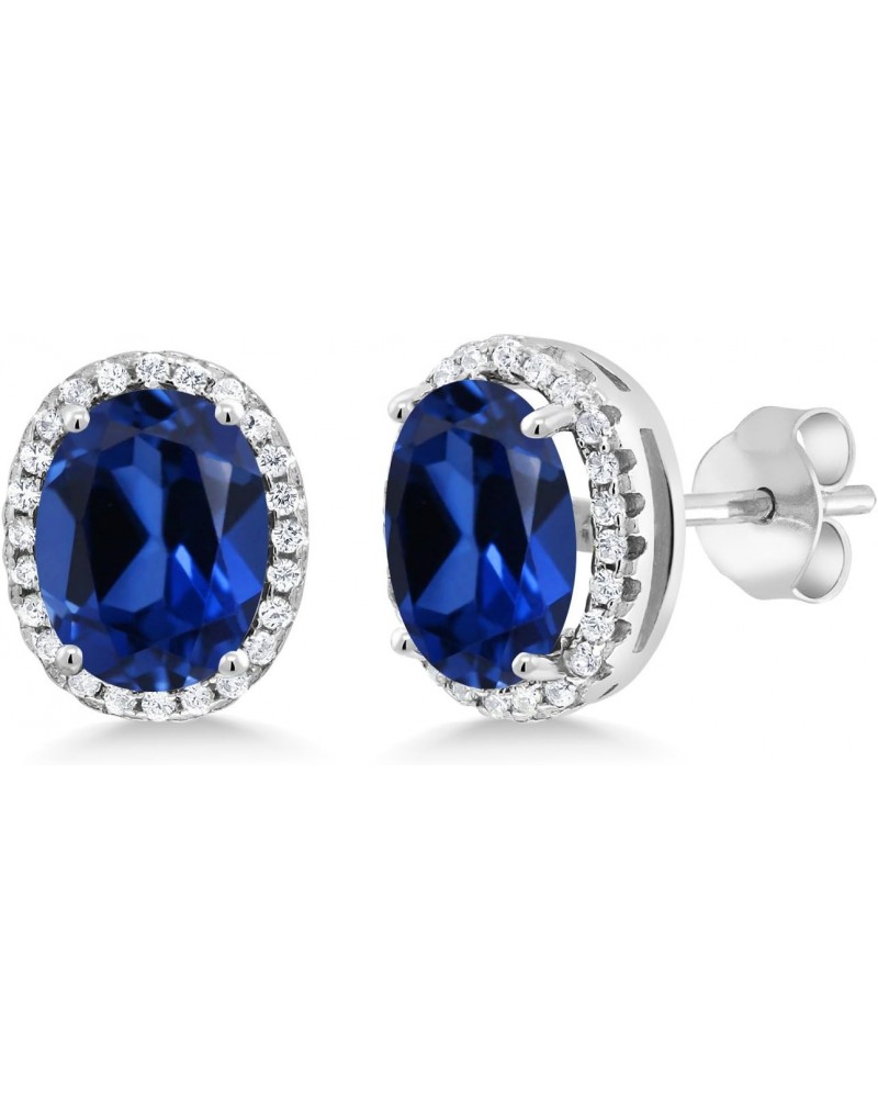 925 Sterling Silver Blue Created Sapphire Halo Earrings For Women (5.08 Cttw, Oval 9X7MM) $28.59 Earrings